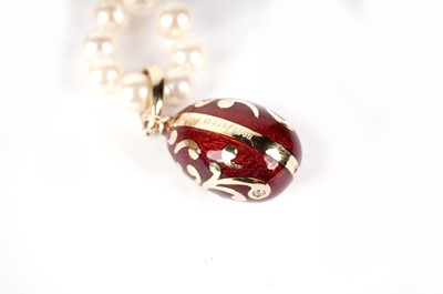 Lot 1217 - Faberge: an egg-pattern pendant on cultured pearl necklace