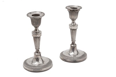 Lot 529 - A silver pair of candlesticks, by Ollivant & Botsford