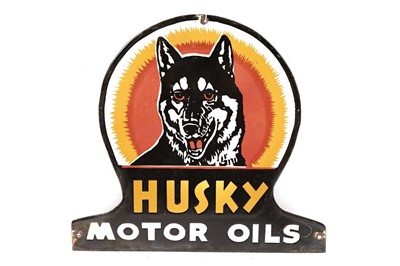 Lot 181 - A Husky Motor Oils enamel advertising sign