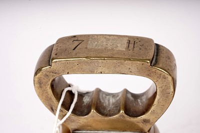 Lot 86 - A harlequin set of antique brass bell weights