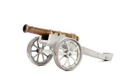 Lot 25 - A brass model canon