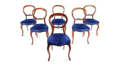 Lot 957 - A set of six Victorian mahogany balloon back chairs