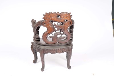 Lot 29 - A Chinese carved hardwood chair