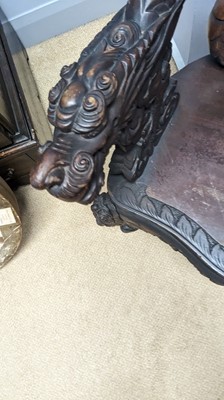 Lot 29 - A Chinese carved hardwood chair