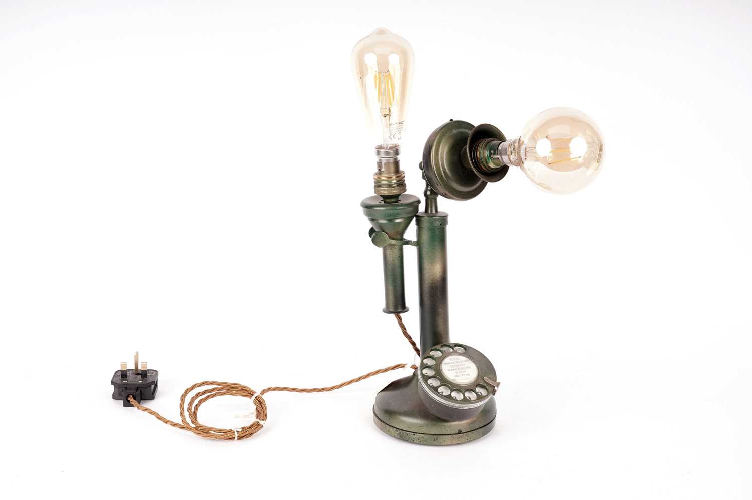 Lot 49 - A kitsch green and gilt painted vintage telephone, converted into a table lamp
