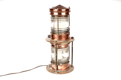 Lot 50 - A Londex Limited London two-tier copper and brass ships lamp