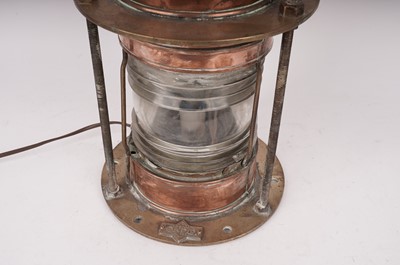 Lot 50 - A Londex Limited London two-tier copper and brass ships lamp