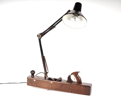 Lot 55 - A carpenter’s oak woodworking plane lamp, converted into a desk lamp
