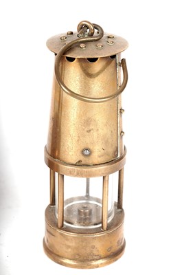 Lot 88 - Three brass miners safety lamps