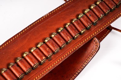 Lot 871 - A pair of cowboy quick-draw pistols in a leather holster