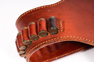 Lot 871 - A pair of cowboy quick-draw pistols in a leather holster