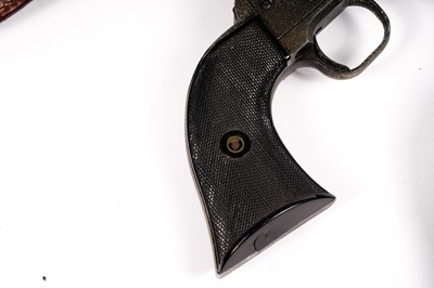 Lot 871 - A pair of cowboy quick-draw pistols in a leather holster