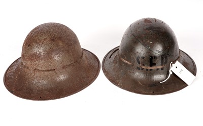 Lot 30 - A WWI Zuckerman helmet; together with a Brodie helmet
