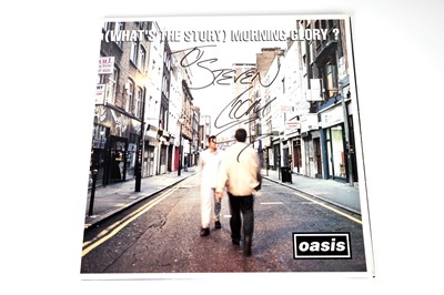 Lot 625 - A signed copy of Oasis - (What's The Story) Morning Glory