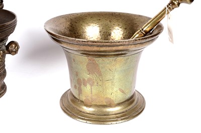 Lot 161 - A 19th Century brass pestle and mortar, and another