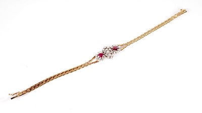 Lot 1221 - A ruby and diamond bracelet