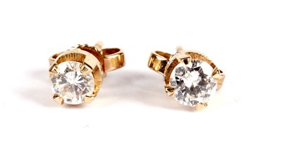 Lot 1225 - A pair of diamond stud earrings