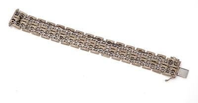 Lot 402 - A 9ct yellow and white gold bracelet