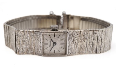 Lot 404 - A Nivada 9ct white gold cocktail watch