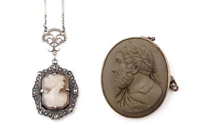 Lot 405 - A carved lava cameo brooch, and a pendant on chain