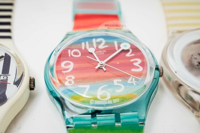 Lot 1052 - Five Swatch watches