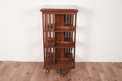 Lot 48 - A three tier walnut revolving bookcase, c1900