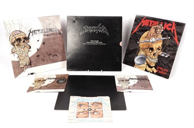 Lot 609 - A collection of Metallica LPs and 7" singles