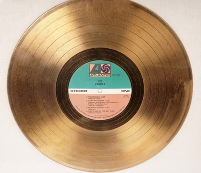 Lot 513 - A framed gold Yes - Fragile LP