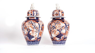 Lot 772 - Pair of Japanese Imari vases and covers