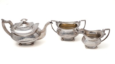 Lot 378 - A George III/IV provincial three-piece tea set