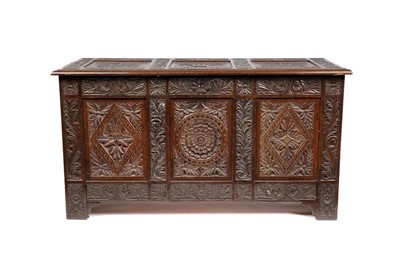 Lot 961 - A substantial carved oak three-panel coffer, 19th Century