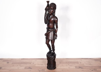 Lot 52 - An African carved hardwood figure