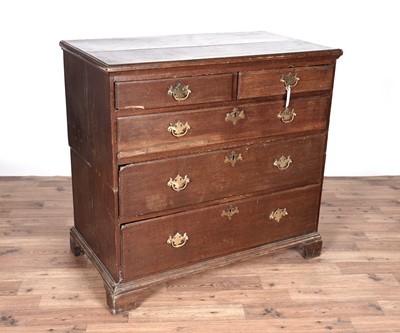 Lot 75 - A George III oak chest of drawers