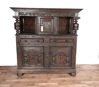 Lot 8 - A substantial 17th Century style inlaid oak court cupboard