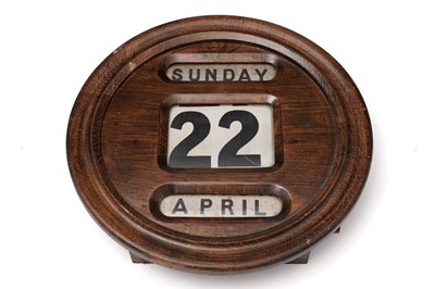 Lot 804 - A vintage stained beech perpetual wall calendar