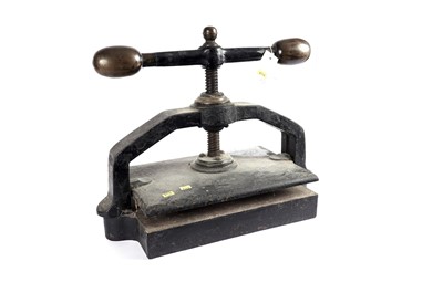 Lot 433 - A Victorian cast metal book press