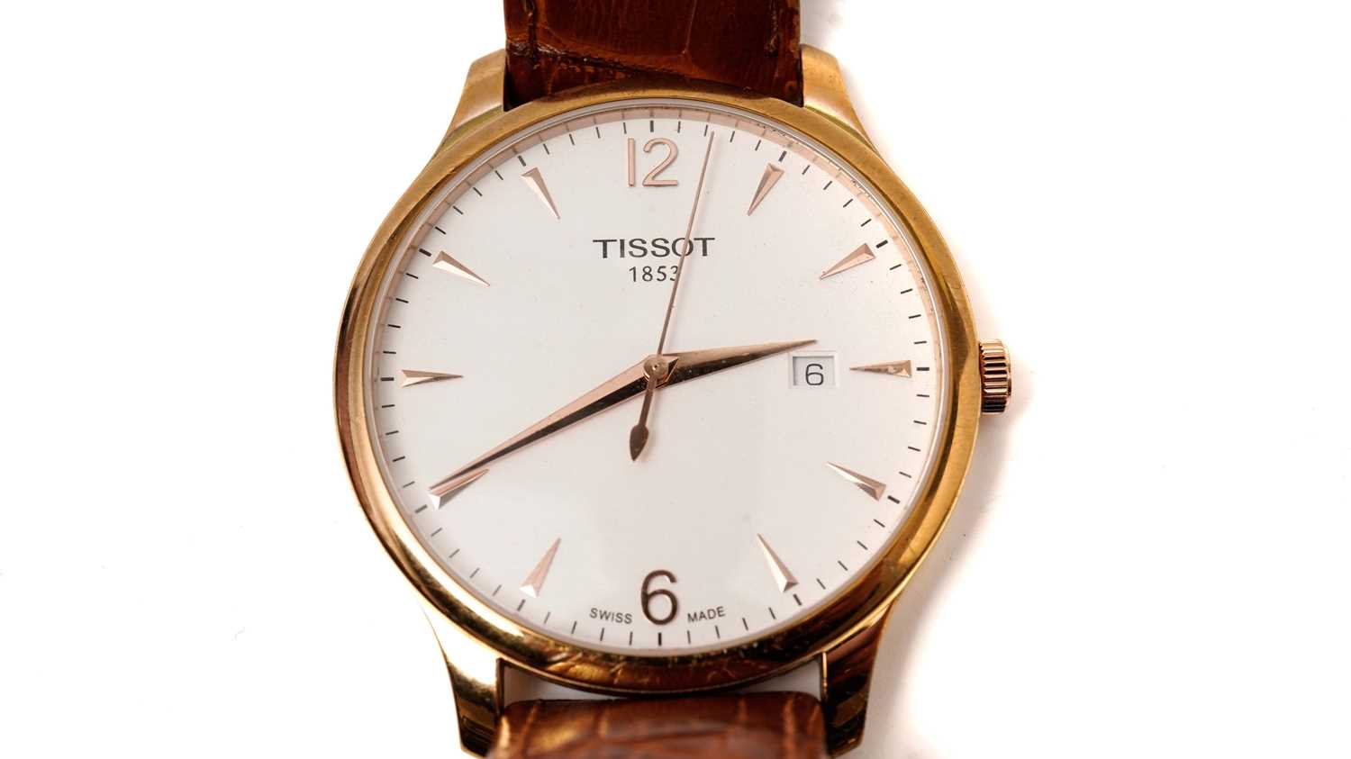 Lot 1057 - Tissot: a gilt steel cased quartz wristwatch