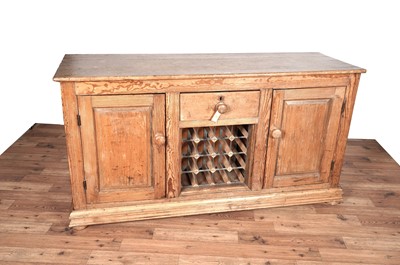 Lot 16 - A Victorian stripped-pine sideboard