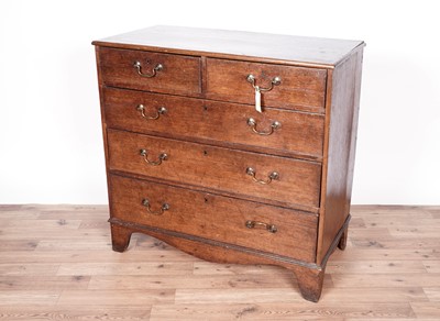 Lot 6 - A George III oak chest of drawers