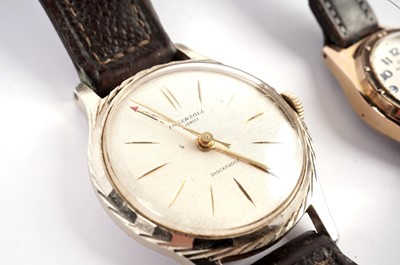 Lot 409 - A 9ct rose gold manual wind wristwatch; and two other watches