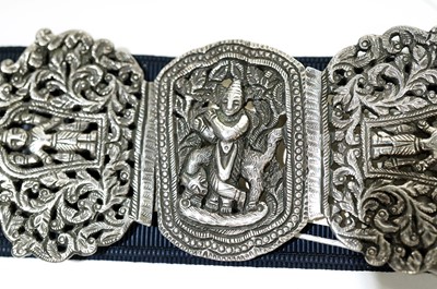 Lot 725 - An Indian white metal "nurses" belt buckle