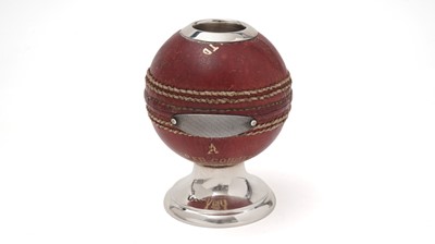 Lot 467 - An Elizbeth II cricket ball vesta holder/striker