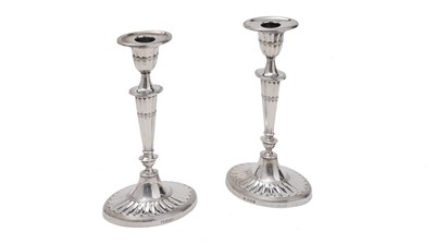 Lot 308 - A pair of George V candlesticks