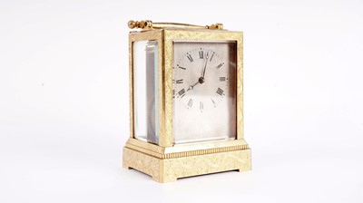 Lot 867 - Vieyres of London: A late 19th Century engraved and gilt brass carriage clock