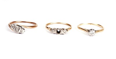 Lot 325 - Three diamond rings