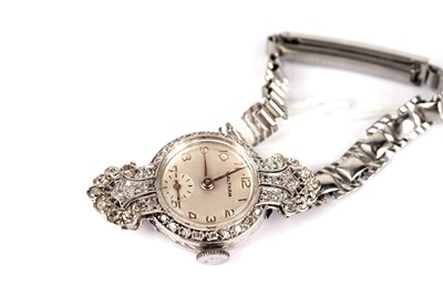 Lot 404 - A Waltham diamond set cocktail watch