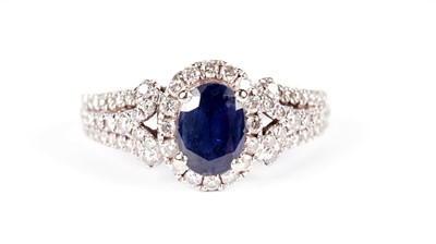 Lot 1077 - Vera Wang, Love: a sapphire and diamond cluster ring