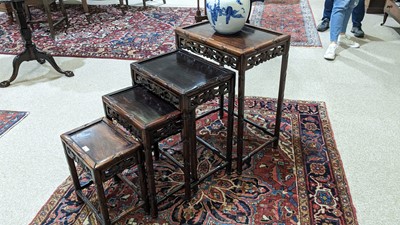 Lot 966 - A Chinese quartetto nest of tables