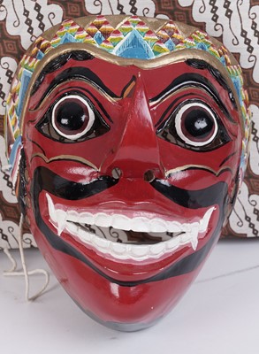 Lot 178 - A collection of vintage hand painted Indonesian Barong masks