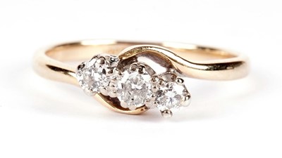 Lot 1272 - A three stone diamond ring